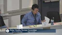 Thumbnail from meeting video shows the health director sitting behind the board.