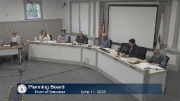 Thumbnail of meeting video is a wide shot of the board with two staff in the meeting room