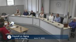 Still of the Council on Aging Board gathered for thier meeting