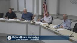 Four mebers of the Historic Distric Committee deliberating on an application