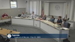 Thumbnail of meeting video shows a wide shot of the committee in meeting room A.