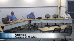 Wide shot of committee in meeting Rm B