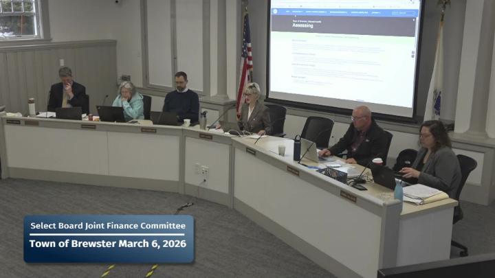 Members of the Select Board members listen to a FY27 budget presentation at their 03-06-2026 meeting